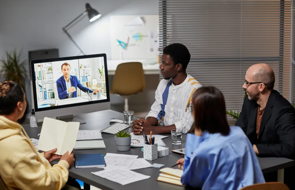 Team meeting with a remote person
